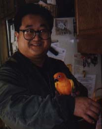 Kim Jong Il double relaxes with mystery parrot